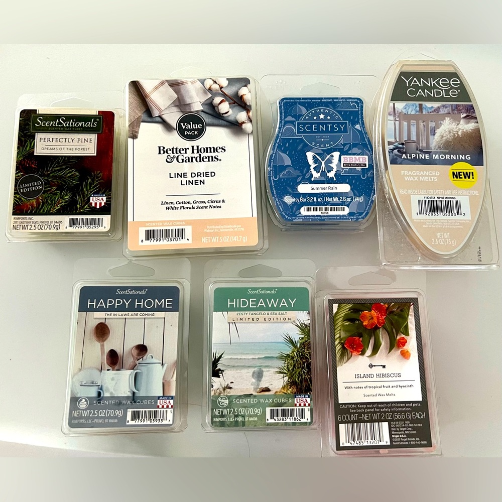 Various Brands Of Scented Wax Cubes. FREE Soy Candle Included with purchase